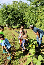 Kidsinthegarden withsquash